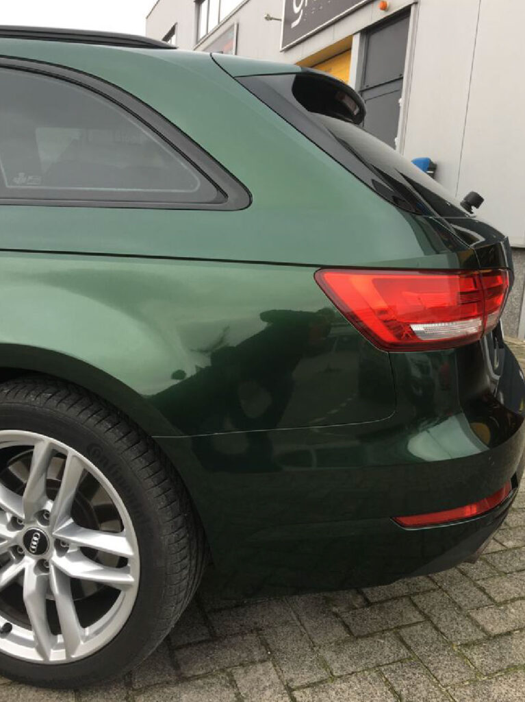 Audi A4 Midnight Green side back