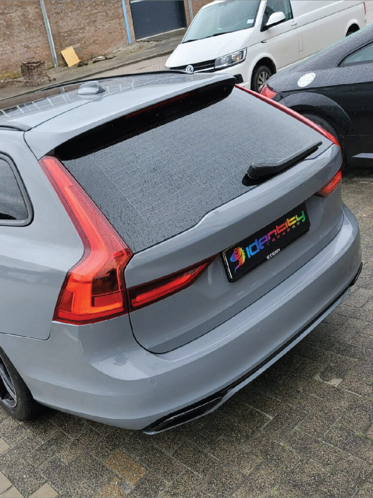 Volvo V90 Nardo Grey back right carwrap chrome delete and window tint